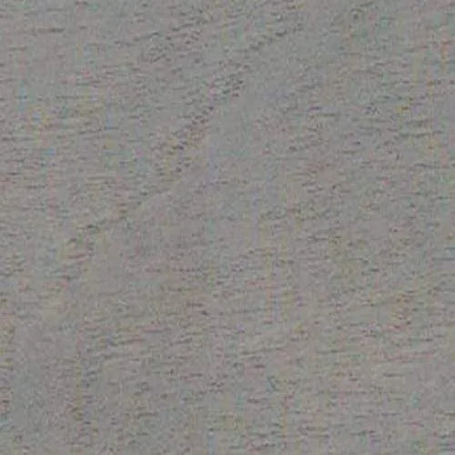 Grijs getextureerd oppervlak met lichte houtnerf